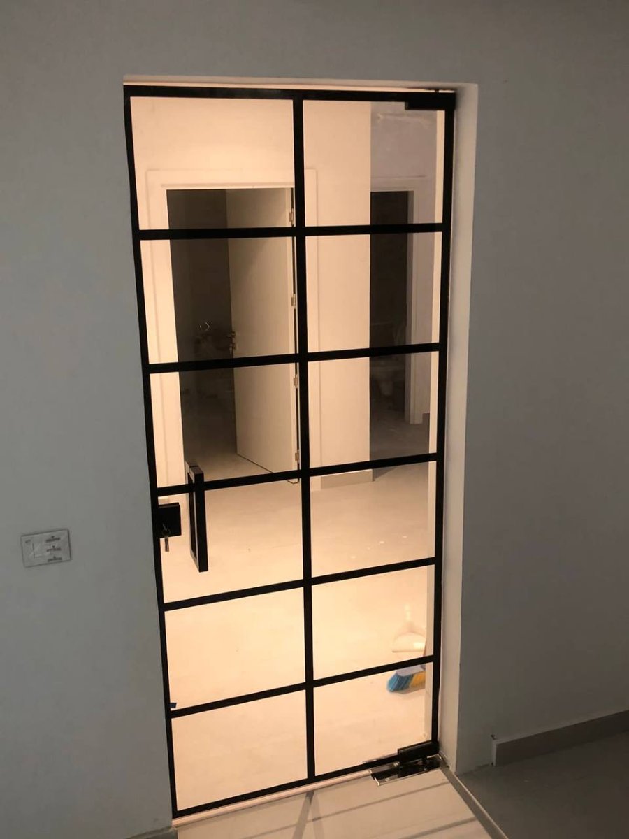 Sliding glass door with wrought iron staircase